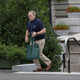 You just know that bag’s full of office supplies (Photo: Chris Kleponis-Pool via Getty Images)